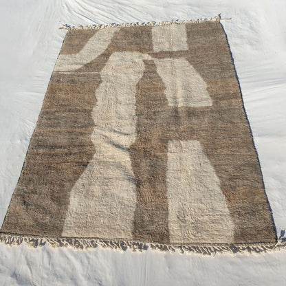 Dense plush pile and earthy brown-ivory patchwork effect in this sumptuous Beni Ourain Berber carpet