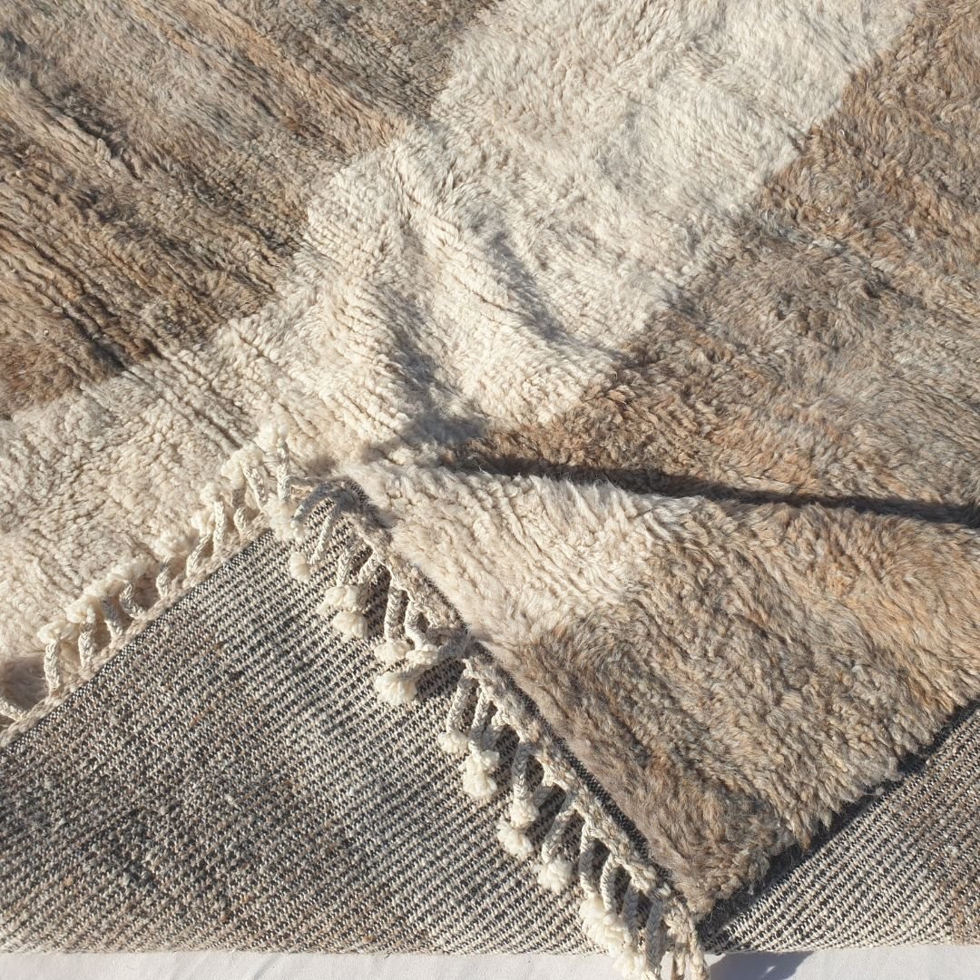 Handwoven fringes and thick plush edge of 7x10 high-quality Beni Ourain Moroccan rug