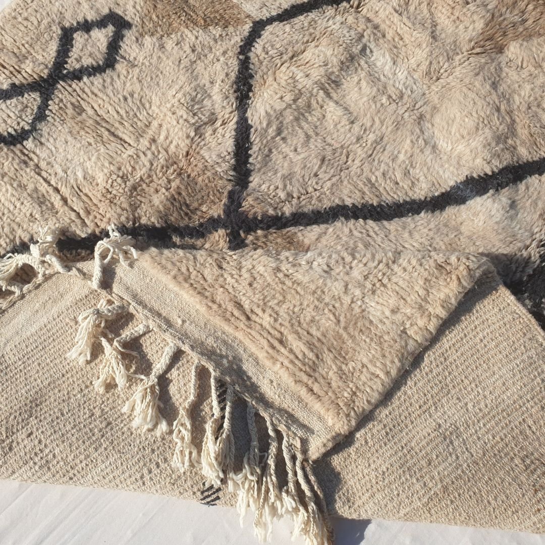 Handwoven fringes and thick plush edge of 6x9 high-quality Beni Ourain Moroccan rug