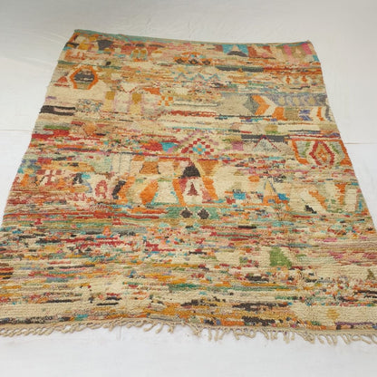 Soft plush wool pile and rich natural color variations of colorful abstract Boujad Berber Moroccan rug