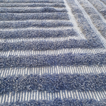 Luxurious fluffy pile on navy blue striped Beni Ourain Moroccan shag rug, soft natural wool texture