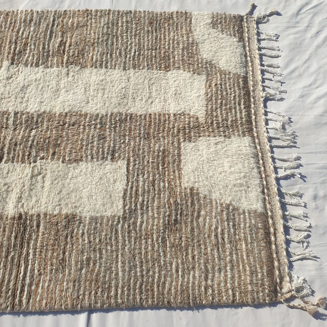 Wide beige taupe vertical stripes and panels on ivory field of authentic Beni Ourain Moroccan wool rug