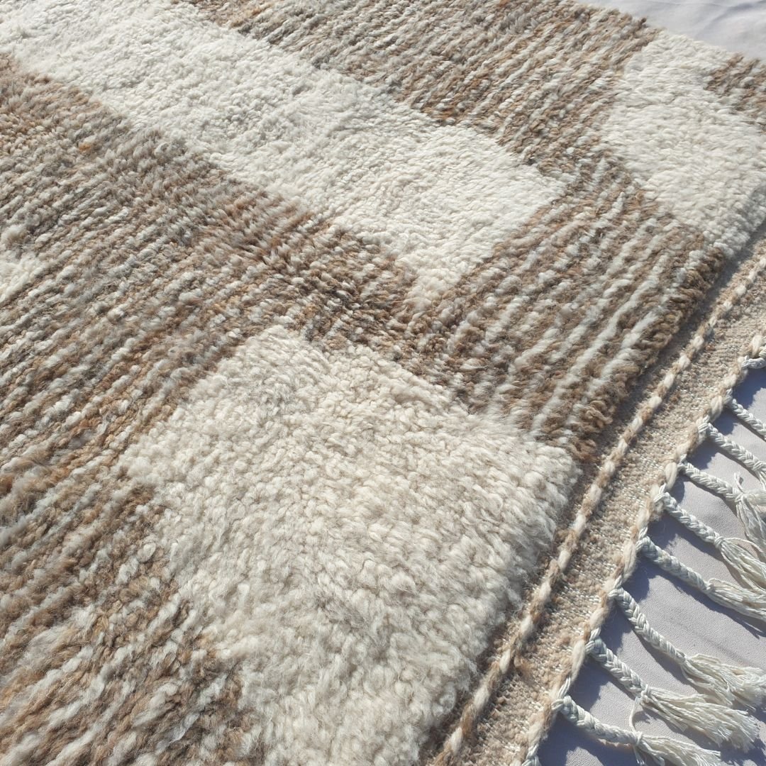 Handwoven fringes and thick ultra fluffy edge of 5x8 high-quality Beni Ourain Moroccan rug