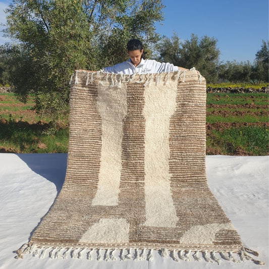 Super soft 5x8 Beni Ourain Moroccan rug in ivory with beige vertical stripes panels ultra thick fluffy pile held outdoors