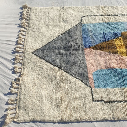 Luxuriously thick plush high-pile wool of colorful abstract Beni Ourain Berber rug showing soft fluffy depth and natural color gradients