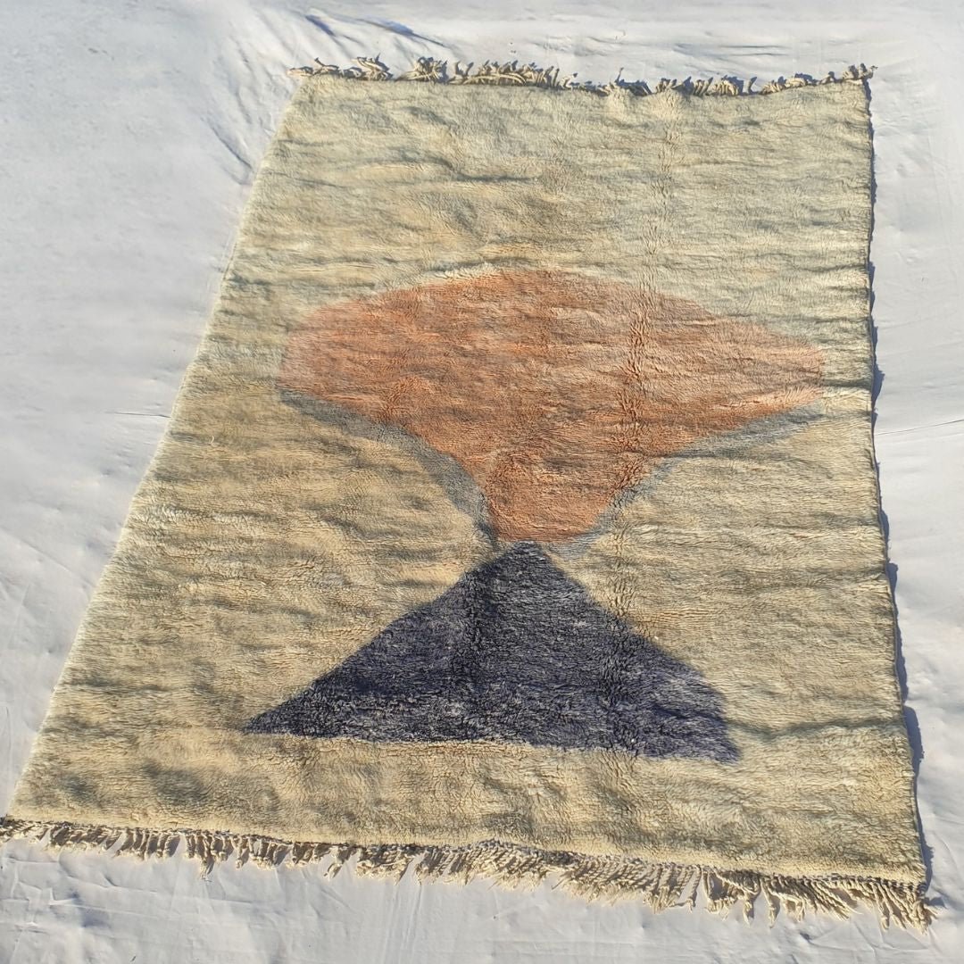 Elegant pastel red with pinkish undertones in this dense luxurious Beni Mrirt Berber carpet