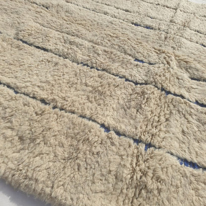 Ifawa - Beni Ourain Rug with Tonal Beige Field and Rare Blue Line Accents - Handwoven Berber Carpet | 6'6"x10'5" Ft | 198x317 cm - OunizZ