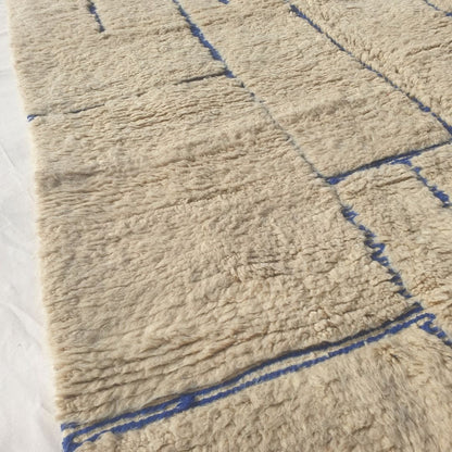 Ifawa - Beni Ourain Rug with Tonal Beige Field and Rare Blue Line Accents - Handwoven Berber Carpet | 6'6"x10'5" Ft | 198x317 cm - OunizZ