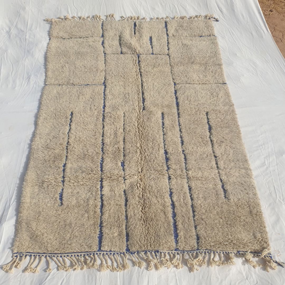 Ifawa - Beni Ourain Rug with Tonal Beige Field and Rare Blue Line Accents - Handwoven Berber Carpet | 6'6"x10'5" Ft | 198x317 cm - OunizZ