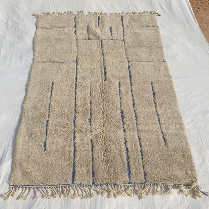 Ifawa - Beni Ourain Rug with Tonal Beige Field and Rare Blue Line Accents - Handwoven Berber Carpet | 6'6"x10'5" Ft | 198x317 cm - OunizZ