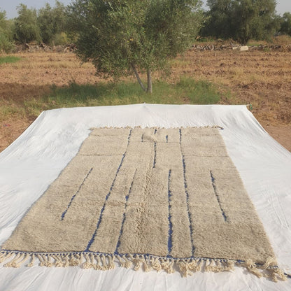 Ifawa - Beni Ourain Rug with Tonal Beige Field and Rare Blue Line Accents - Handwoven Berber Carpet | 6'6"x10'5" Ft | 198x317 cm - OunizZ