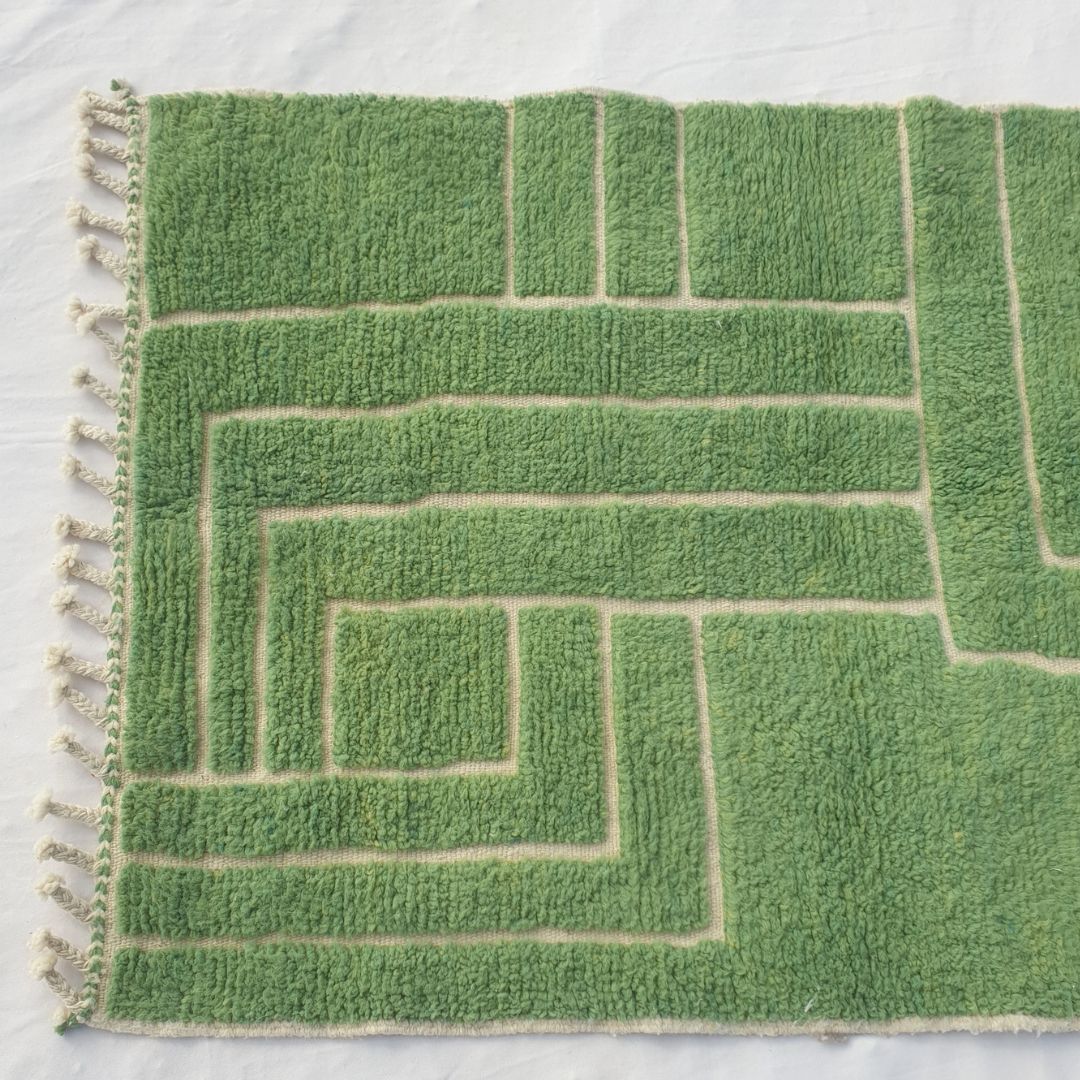 Bold green maze/labyrinth paths forming geometric design on plush field of authentic Beni Ourain Moroccan wool rug