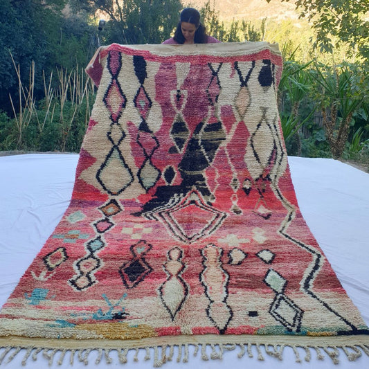 Bold pink diamond Boujad rug 6x10 ft with black ivory geometric patterns – handwoven colorful Moroccan wool