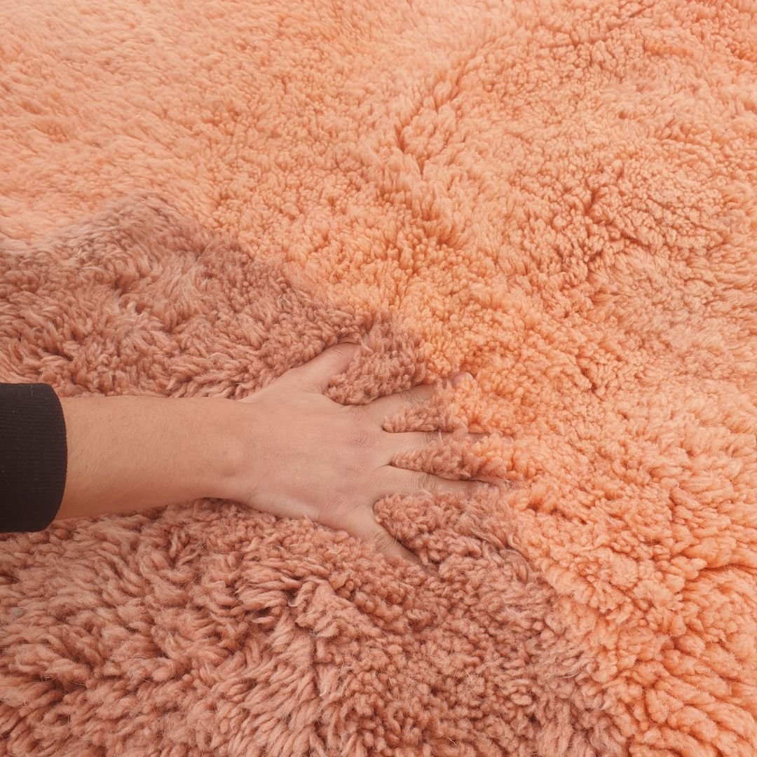 Full texture view of terracotta peach lavender gradient Moroccan wool rug perfect for living room floors and tranquil modern decor