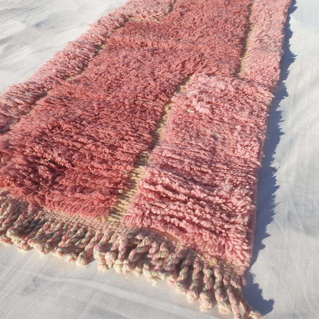 Detailed abstract wavy pattern with rich olive green upper section flowing into soft pastel pink lower half on this fluffy Moroccan hallway rug