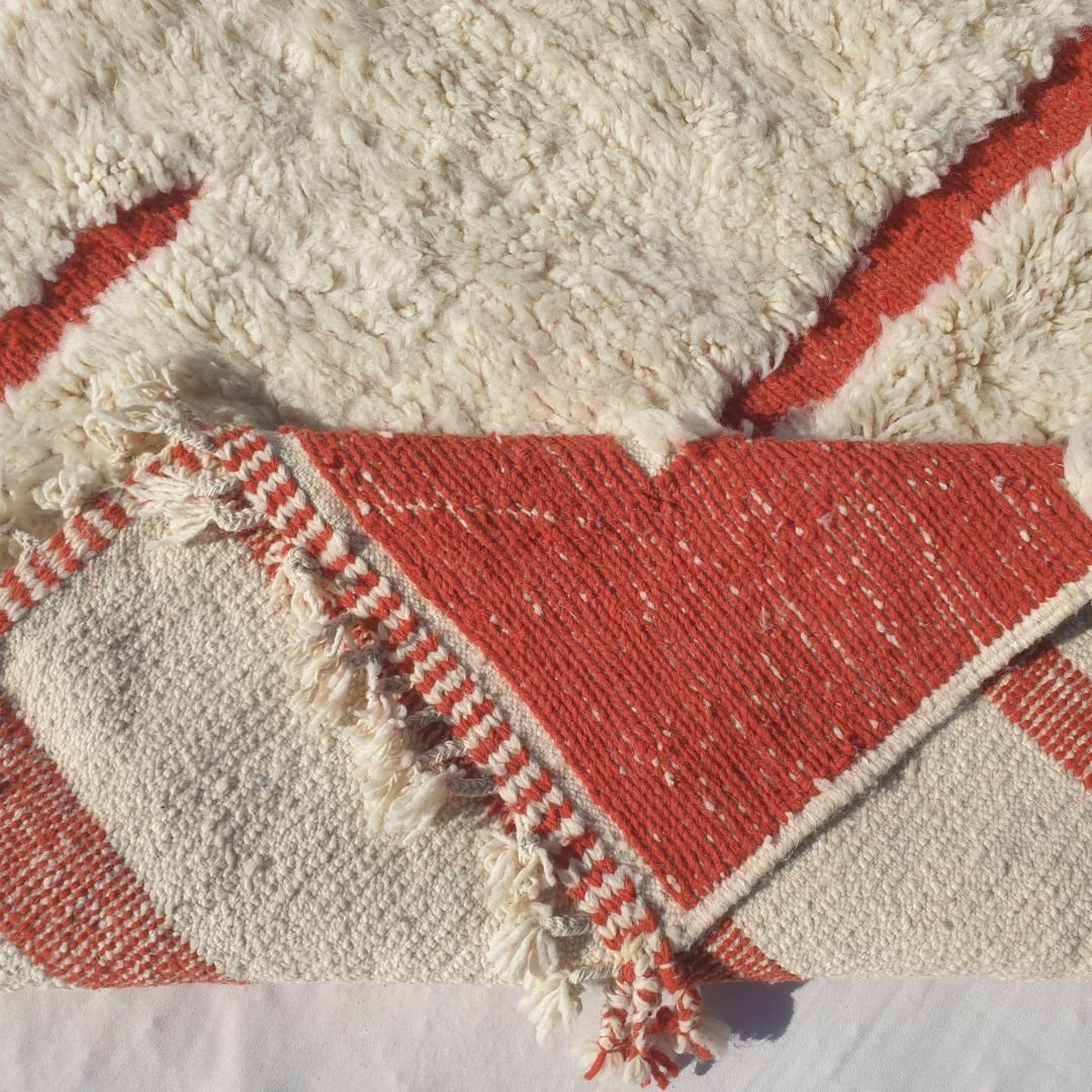 Handwoven fringes and thick ultra fluffy edge of 5x8 high-quality Beni Ourain Moroccan rug