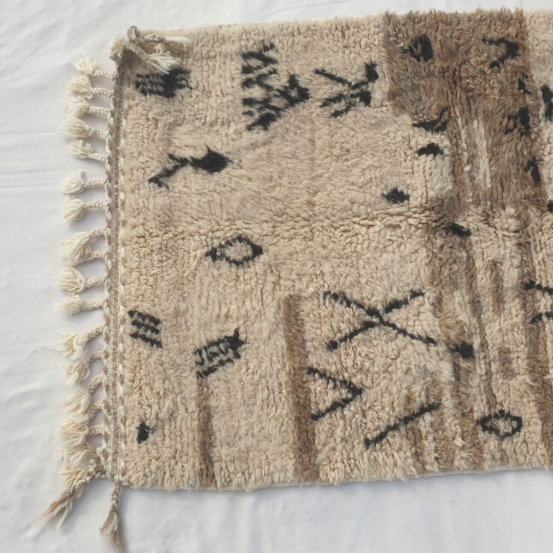 Nama | 3x5 Beni Ourain Rug - Soft Beige Moroccan Shag Rug with Black Geometric Symbols | 3'8"x5'3" Ft | 112x160 cm - OunizZ