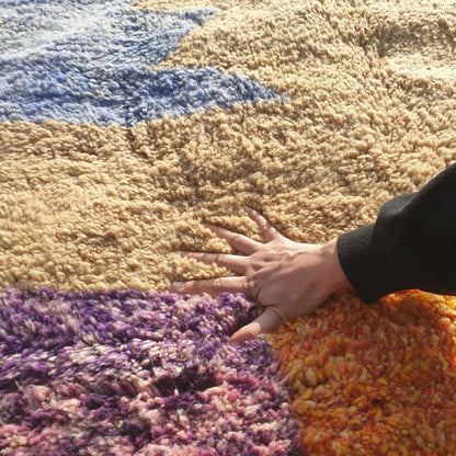 Close-up of ultra-plush thick shag pile and soft natural wool texture on handmade Beni Mrirt luxury rug