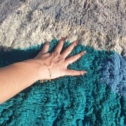 Soft fluffy high-pile wool texture detail of teal Beni Mrirt luxury shag runner rug