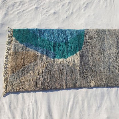 Vibrant teal turquoise section blending into neutral beige tones on authentic Beni Mrirt Moroccan wool runner