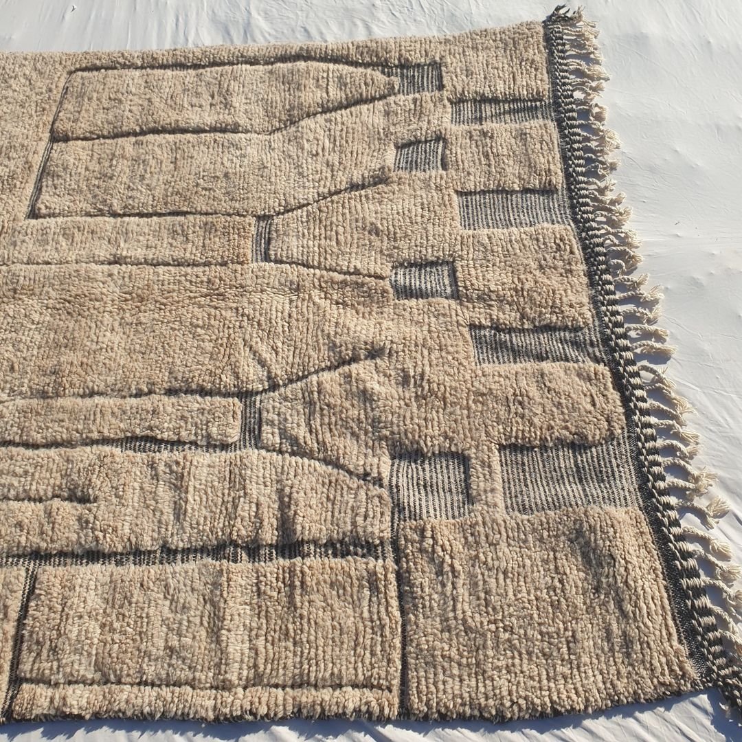 Thick plush high-pile wool of black and white abstract Beni Ourain Berber shag rug with deep black elements and soft natural ivory background