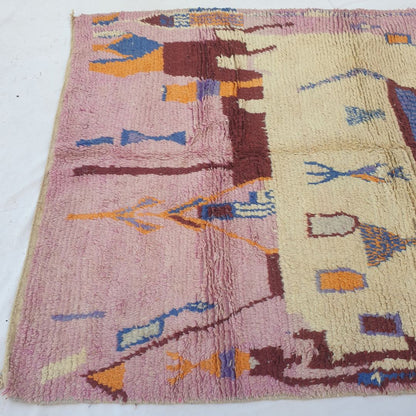 Tescla – 6x9 Moroccan Rug – Pink Ivory Boujad Berber Handwoven Wool Carpet with Blue Triangle & Figurative Symbols | 6'7"x9'7" Ft | 201x294 cm - OunizZ