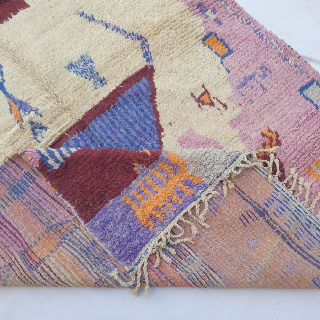 Tescla – 6x9 Moroccan Rug – Pink Ivory Boujad Berber Handwoven Wool Carpet with Blue Triangle & Figurative Symbols | 6'7"x9'7" Ft | 201x294 cm - OunizZ