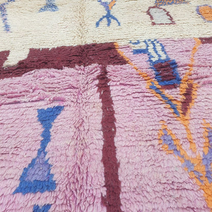 Tescla – 6x9 Moroccan Rug – Pink Ivory Boujad Berber Handwoven Wool Carpet with Blue Triangle & Figurative Symbols | 6'7"x9'7" Ft | 201x294 cm - OunizZ