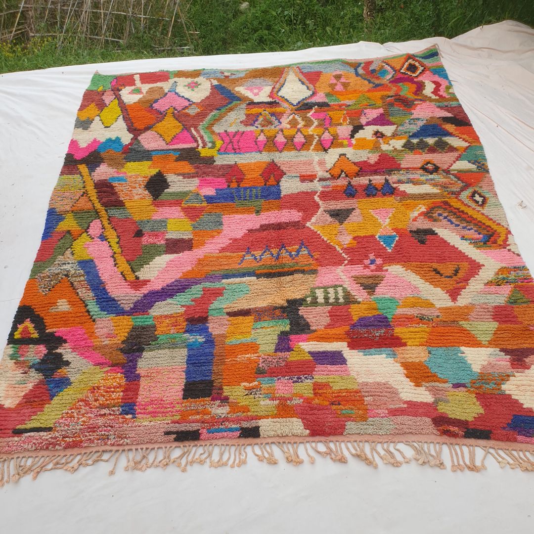 Authentic Boujad Moroccan rug 315×380 cm laid flat — maximalist all-over multicolor composition with dense geometric patterns in orange, hot pink, red, cobalt blue, purple, teal, yellow and lime green, handmade in Morocco by Berber women, one-of-a-kind piece