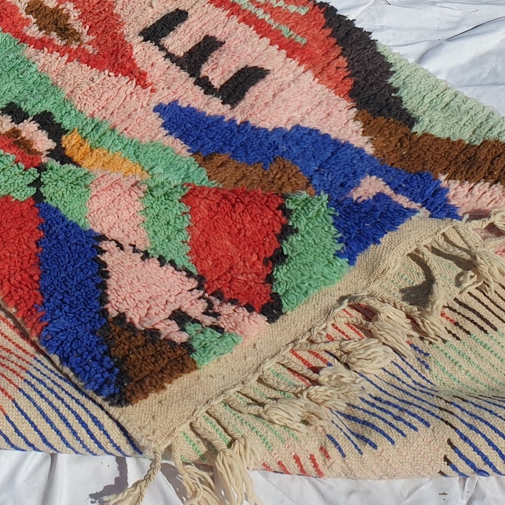 https://ounizz.com/cdn/shop/products/ghanji-82x5-ft-25x15-m-moroccan-colorful-rug-100-wool-handmade-150595.jpg?v=1657017931